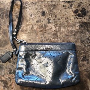 Silver metallic Coach wristlet